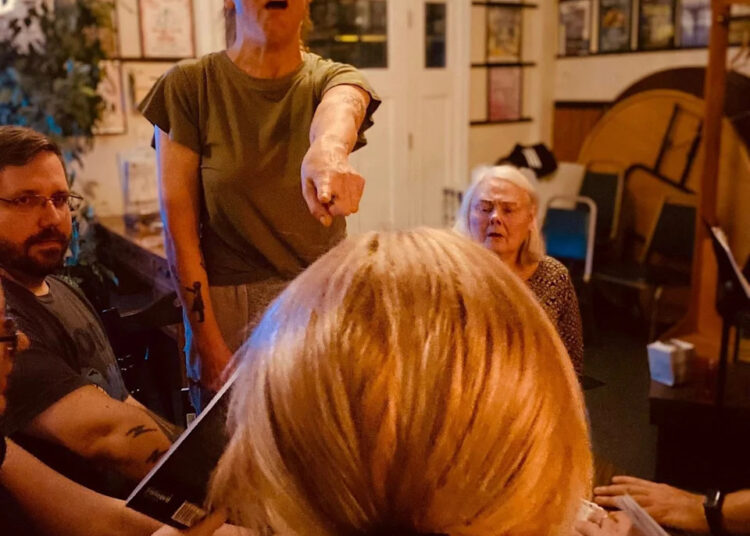 The cast of The Masquers' 'The Games Afoot' rehearses a scene.