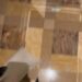 floor design in a luxurious setting with feet partially visible