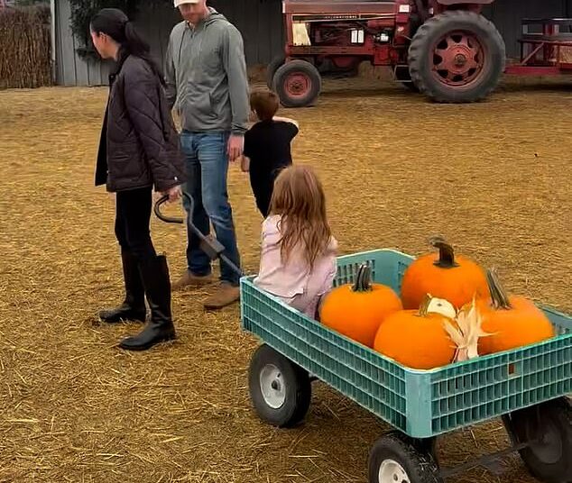 Meghan Markle looked casual but chic in a quilted jacket and smart leather boots as she enjoyed a Halloween trip to a pumpkin patch this weekend