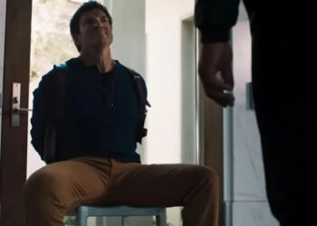 Goon looming over Nathan Drake tied to chair in Uncharted fan film (2018)