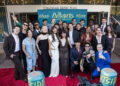 The cast of “The Outsiders” pose on Oct. 8 for a group shot during the red carpet event for “The Outsiders” musical at the Tulsa Performing Arts Center in Tulsa.