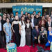 The cast of “The Outsiders” pose on Oct. 8 for a group shot during the red carpet event for “The Outsiders” musical at the Tulsa Performing Arts Center in Tulsa.