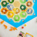 An overhead shot of the Catan game board