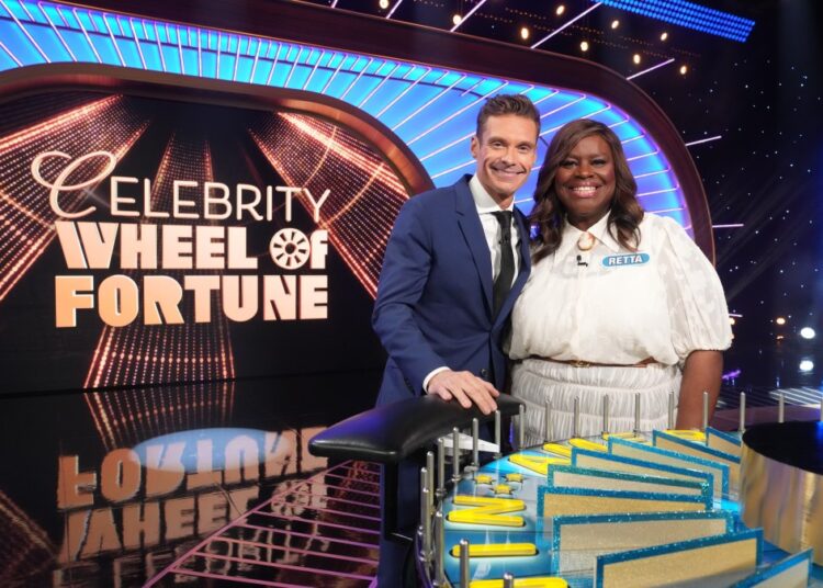 Ryan Seacrest and Retta