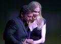 Taylor Sheridan laughs next to Nicole Kidman