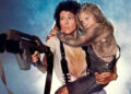 Ellen Ripley holds Newt tight while battling Xenomorphs in Aliens