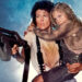 Ellen Ripley holds Newt tight while battling Xenomorphs in Aliens