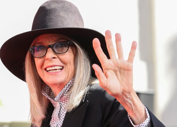 Actor Diane Keaton waves during handprints and footprints ceremony at TCL Chinese theatre in Los Angeles, California, U.S., August 11, 2022. REUTERS/Mario Anzuoni