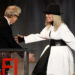 FILE - Filmmaker Woody Allen, left, greets actress Diane Keaton onstage to present her with the 45th AFI Life Achievement Award on June 8, 2017, in Los Angeles. (Photo by Chri