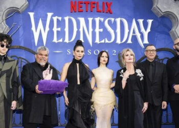 Isaac Ordonez, Luis Guzman, Catherine Zeta-Jones, Jenna Ortega, Joanna Lumley, Fred Armisen and Victor Dorobantu pose at the premiere of 'Wednesday' in July 2025 in LA.