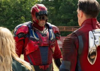 David Denman's Keith Smith wearing Captain Triumph armor while facing John Cena's Peacemaker and Jennifer Holland's Emilia Harcourt on Peacemaker
