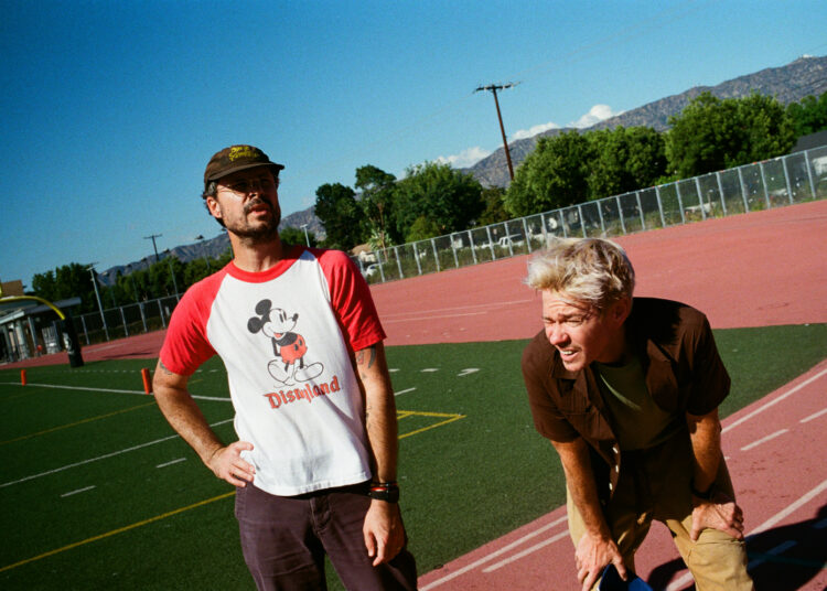 Two men on a sports field