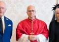 Pope Leo stands in the middle of King Charles and Queen Camilla