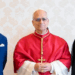 Pope Leo stands in the middle of King Charles and Queen Camilla