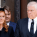 Sarah Ferguson and Prince Andrew wearing black clothing at the Duchess of Kent's funeral
