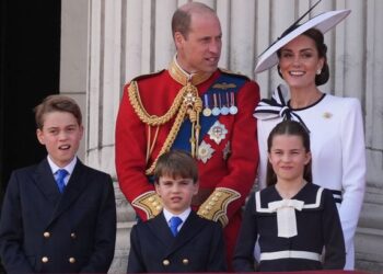 The Prince and Princess of Wales with their children, Prince George, Prince Louis, and Princess Charlotte, on the balcony of Buckingham Palace, Londo