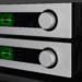 Quad Platina Integrated amplifier on top of the Platina Stream network streamer on a black background