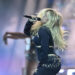Renee Rapp performs onstage.
