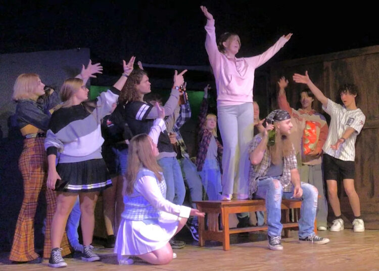 Actors rehearse a scene from the musical "Carrie" based on the Stephen King novel and 1976 film to be presented at the Renner Theatre.