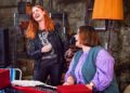 Rosalie Craig as Kitty singing as Joanna Scanlan as Beth plays a keyboard and sings