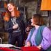 Rosalie Craig as Kitty singing as Joanna Scanlan as Beth plays a keyboard and sings