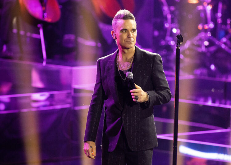 Robbie Williams jokingly removes himself from the running to be next James Bond