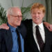 Prolific actors Paul Newman, left, and Robert Redford pose for photos arm in arm during the 2004 Westport Country Playhouse gala in Greenwich. (Christian Abraham/File Photo)