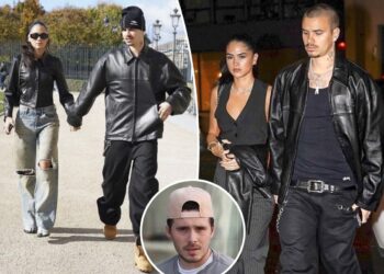 Romeo Beckham and Kim Turnbull hold hands in Paris after reigniting romance