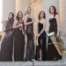 The Seraph Brass ensemble includes Mary Elizabeth Bowden, trumpet; Morgen Low, trumpet; Layan Atieh, horn; Lauren Casey-Clyde, trombone; and Robyn Black, tuba. The women, all wearing long brass dresses and holding their instruments, stand fr a group photo. (Courtesy photo)