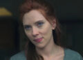 Natasha looking out at a friend in Black Widow.