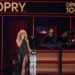 Sabrina Carpenter performs her most country songs at the Grand Ole Opry in a fringed little black dress