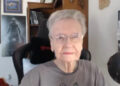 Skyrim Grandma sitting at her desk talking to her "grandkids."