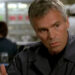 Jack leans forward and tilts his head in Stargate SG-1