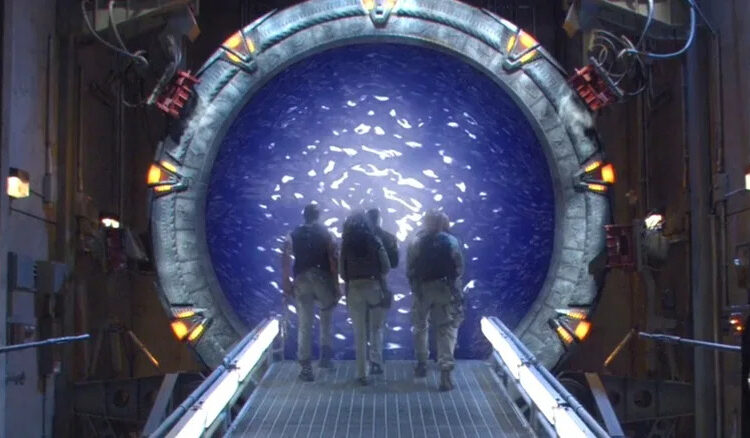 The SG-1 crew walk inside one of the titular devices in Stargate SG-1