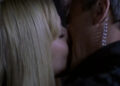 RIchard Dean Anderson's Jack O'Neill kisses Amanda Tapping's Samantha Carter in Stargate SG-1