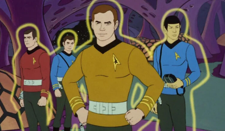 Scotty, McCoy, Kirk, and Spock in yellow force fields in Star Trek: The Animated Series