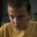 Eleven wearing a yellow t-shirt on Stranger Things