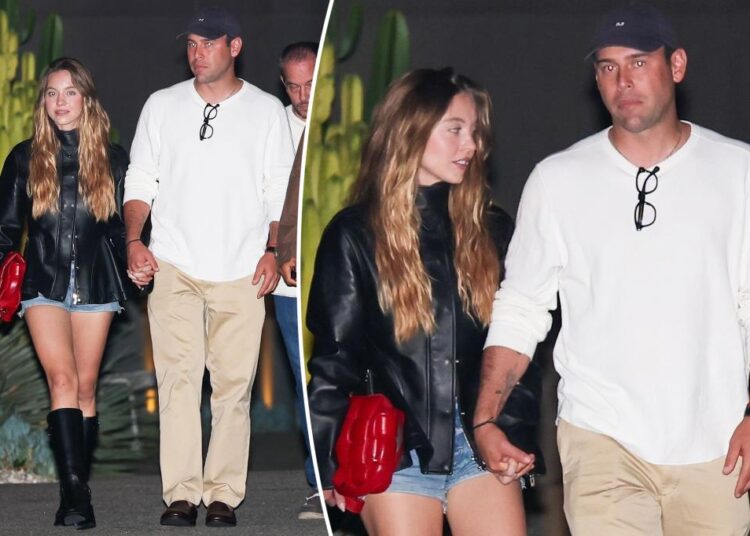 Sydney Sweeney and Scooter Braun hold hands on date night as romance goes 'full throttle'