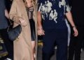 Taylor Swift released her raunchiest song yet with her track Wood from her new album The Life of a Showgirl; pictured with fiancé Travis Kelce in October 2024