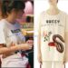Taylor Swift wearing a Gucci t-shirt in the Miss Americana documentary