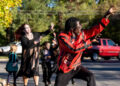 Shawn Mayes plays the role of Michael Jackson as members of the Terpsichore Dance Company rehearsed Michael Jackson’s “Thriller” at Tom Sawyer Park ahead of their performance Saturday at the Halloween Parade & Festival in NuLu. Oct. 20, 2025.