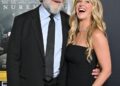 Russell Crowe and Britney Theriot attend the 2025 AFI FEST premiere for Nuremberg