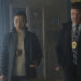 Annie Chang as Sophie Song and Lochlyn Munro as Larry Fitzgibbon standing around at a crime scene in Peacemaker season 1