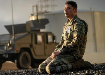 Major Daniel Gonzalez kneeling on a road in A House of Dynamite