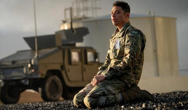 Major Daniel Gonzalez kneeling on a road in A House of Dynamite