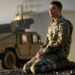 Major Daniel Gonzalez kneeling on a road in A House of Dynamite