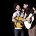 Scott and Seth Avett of The Avett Brothers perform near the front of the catwalk at Common Ground Music Festival on July 13, 2013.
