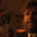 Rabbi Uris holding the Flash #123 comic in It: Welcome to Derry