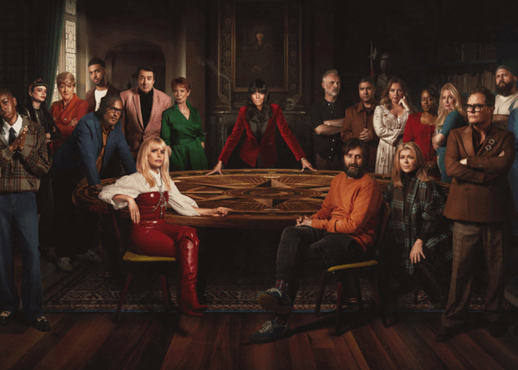 The Celebrity Traitors cast sit around the round table.