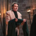 Jonathan Ross accepts the traitors cloak from Claudia Winkleman. (BBC/Studio Lambert/Euan Cherry)